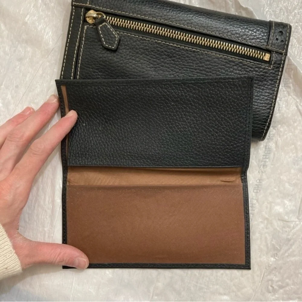 Dooney and Bourke rare perforated black pebbled leather 2 piece wallet set